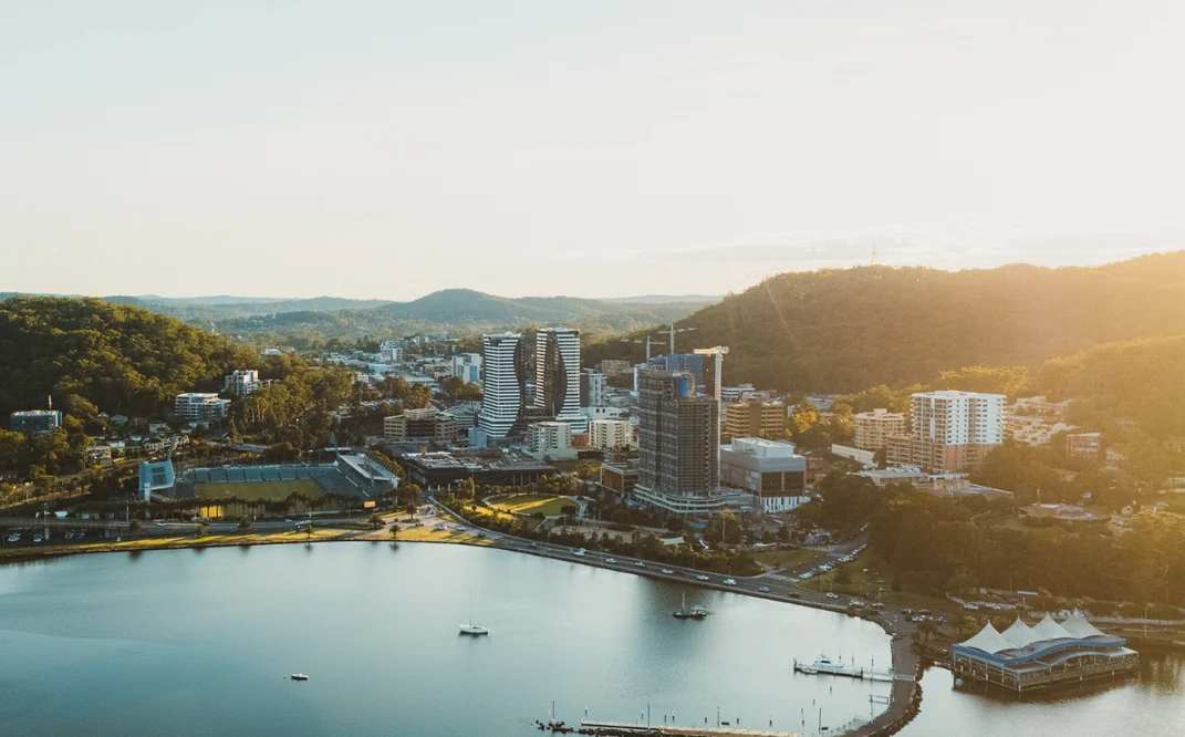 Aerial view of the Gosford waterfront and city centre at sunset